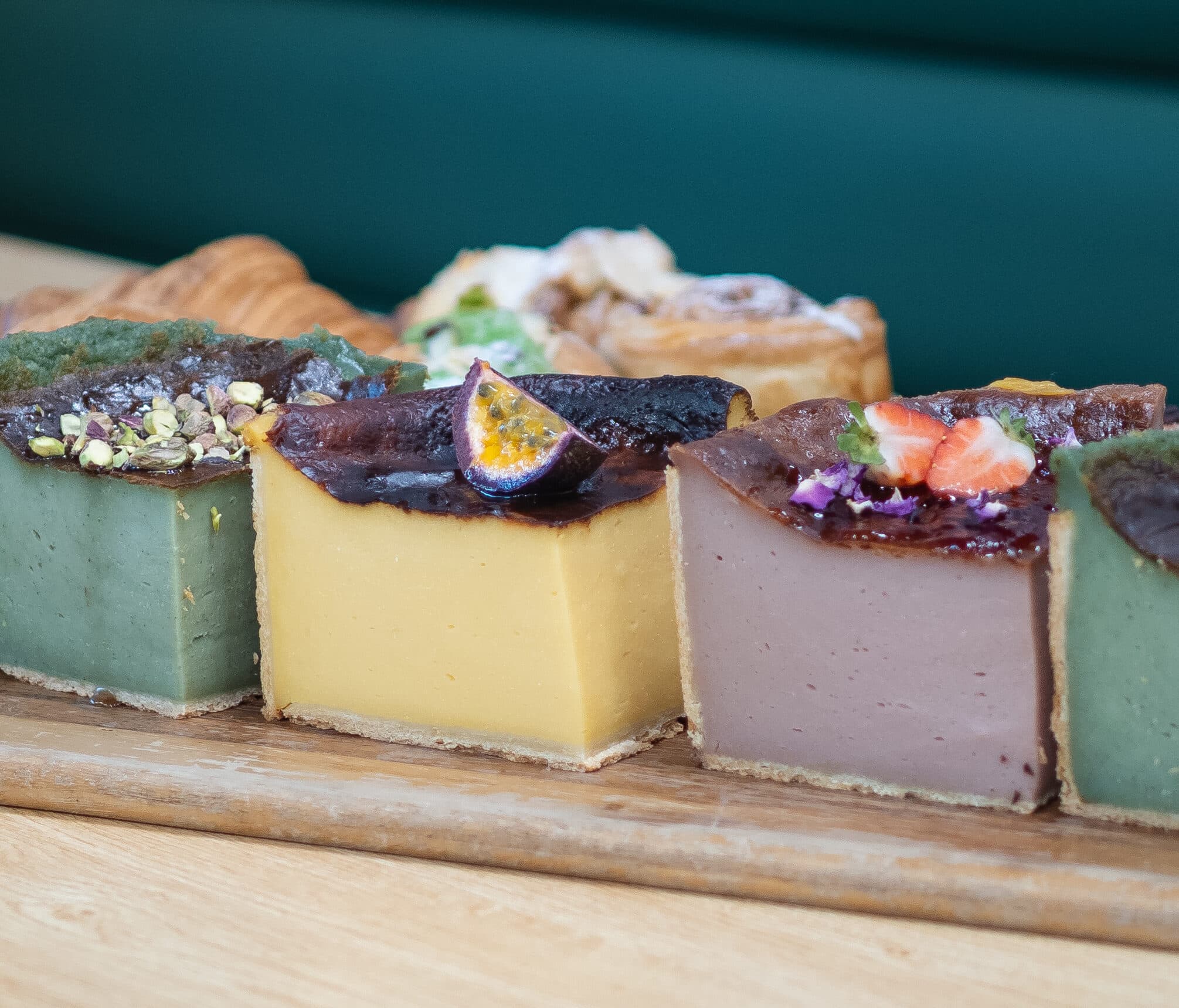 A tight close-up of decorated dessert squares