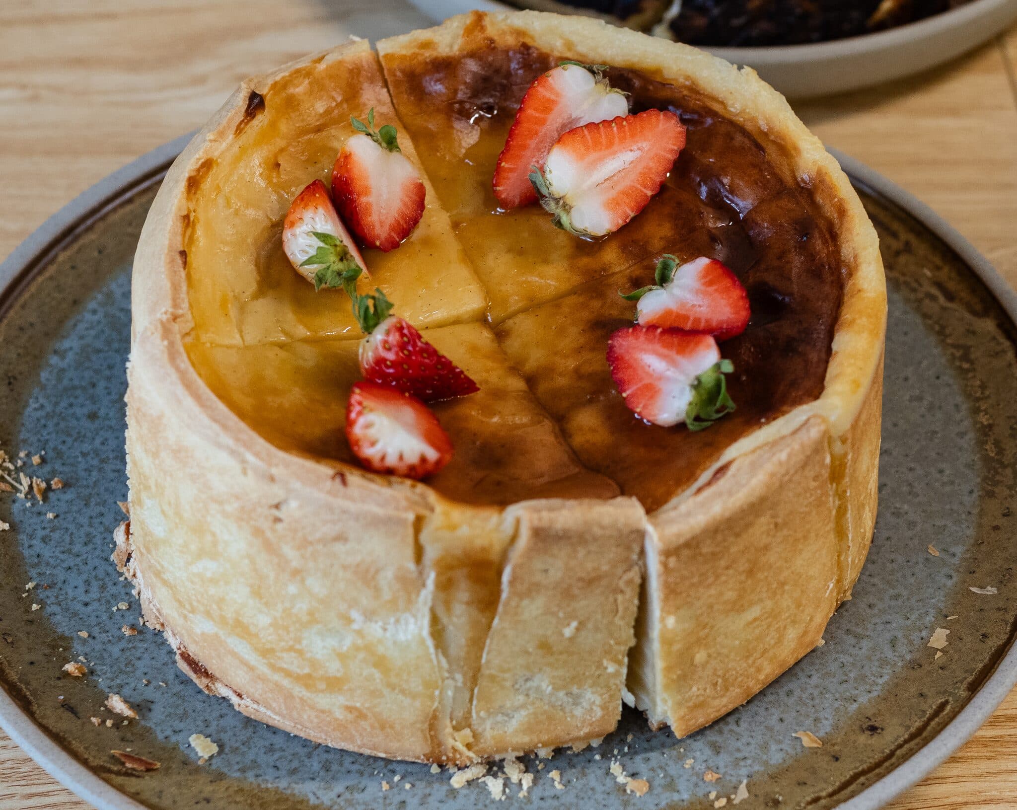 A strawberry-topped house-made pastry